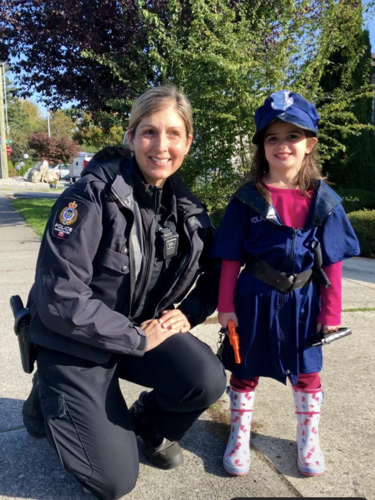 Cst. Holly Christie with little girl in policewoman costume