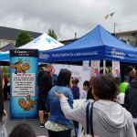 We joined Hastings Sunrise Community Policing Centre volunteers to chat with the community about 9-1-1 tips at the Sunrise Summer Kick-off in the East Village in Vancouver on July 7, 2018.