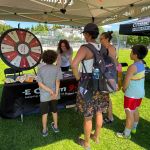 E-Comm's Communications Manager, Kaila Butler shared important 9-1-1 information with visitors at Collingwood Days on July 23 Communications Manager Kaila Butler sharing important 9-1-1 information with visitors at Collingwood Days on July 23 in Vancouver.